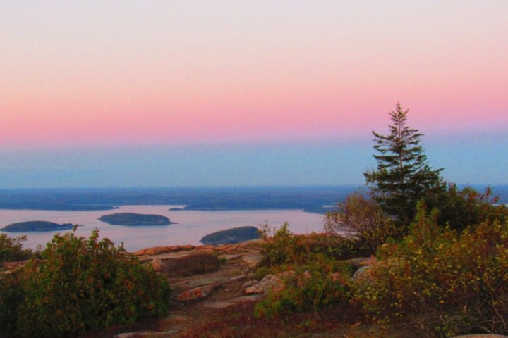 a sunset over a body of water