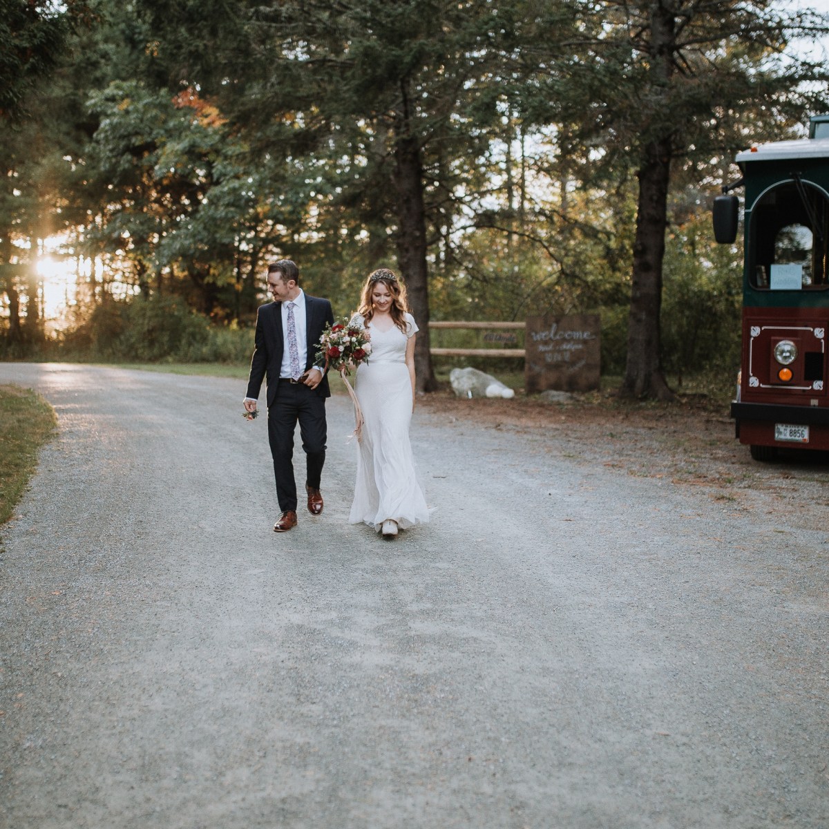 a person riding a bike down a dirt road