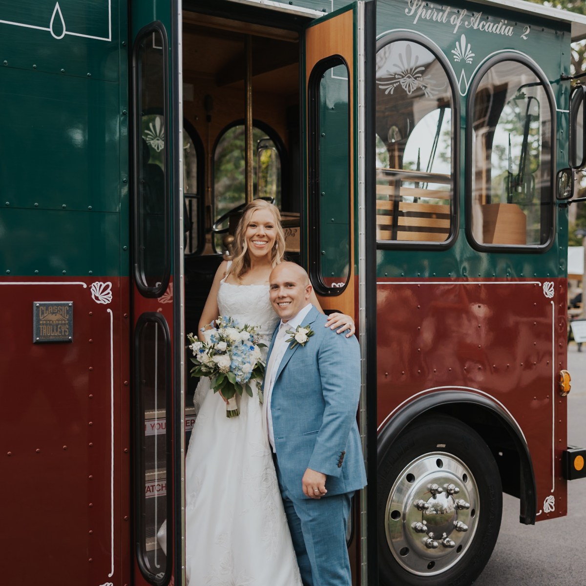 a person standing in front of a bus