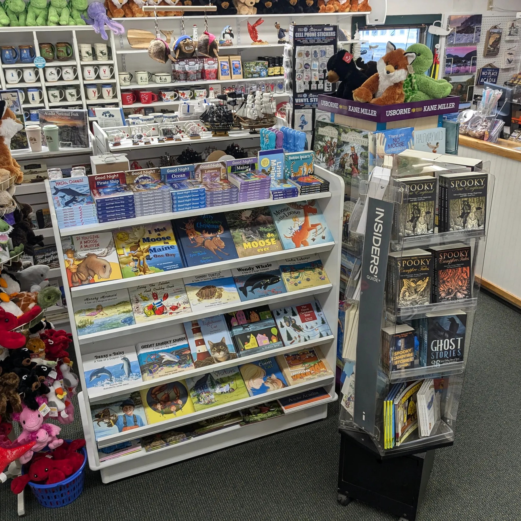 a group of teddy bears on display in a store