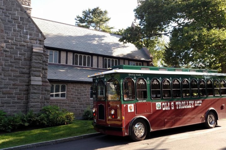 a bus parked in front of a house