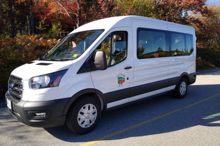 a van parked on the side of a road