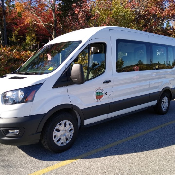 a van parked on the side of a road