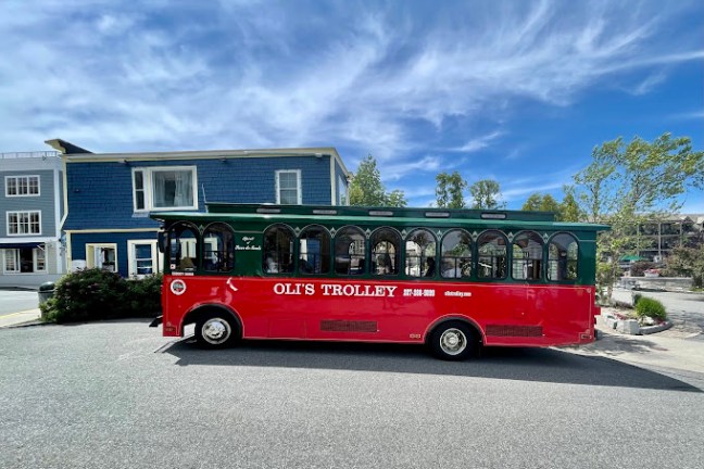 a fire truck parked in front of a bus
